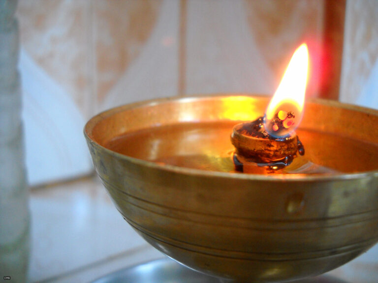how to put out an oil lamp fire